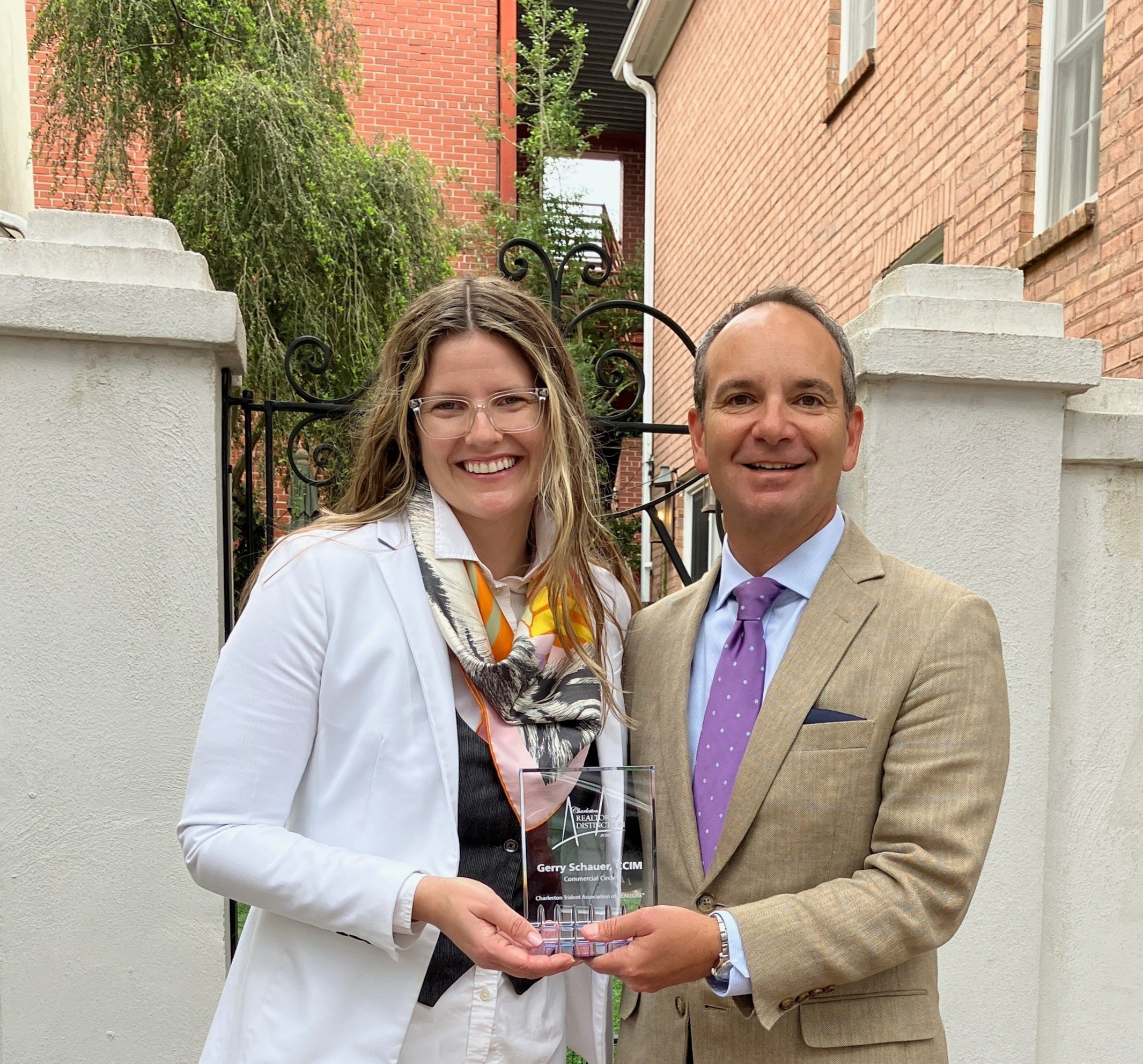 Two Avison Young brokers receive REALTORS® of Distinction Award